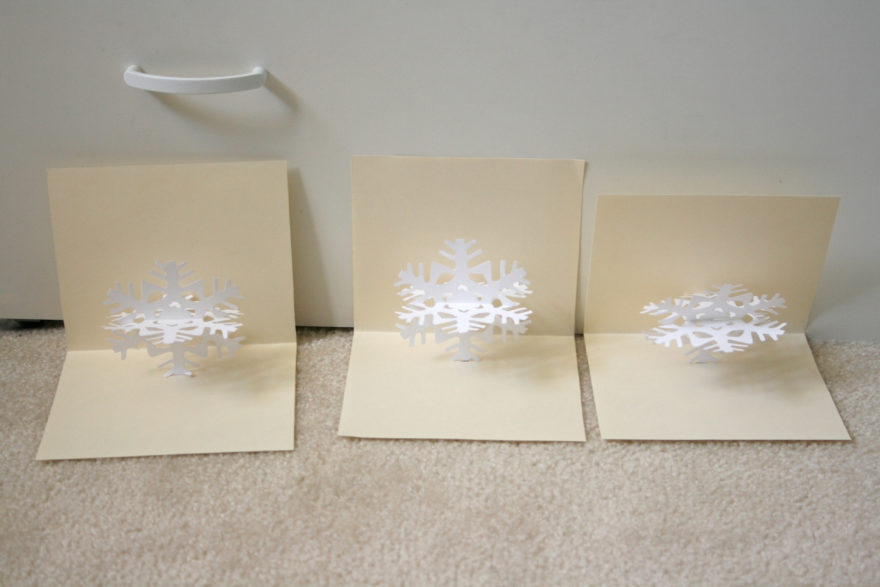Handmade Christmas Cards - gluing in the snowflakes