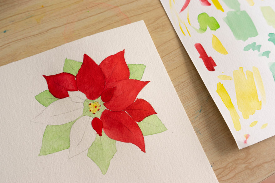 Half painted the red colours of the flower design
