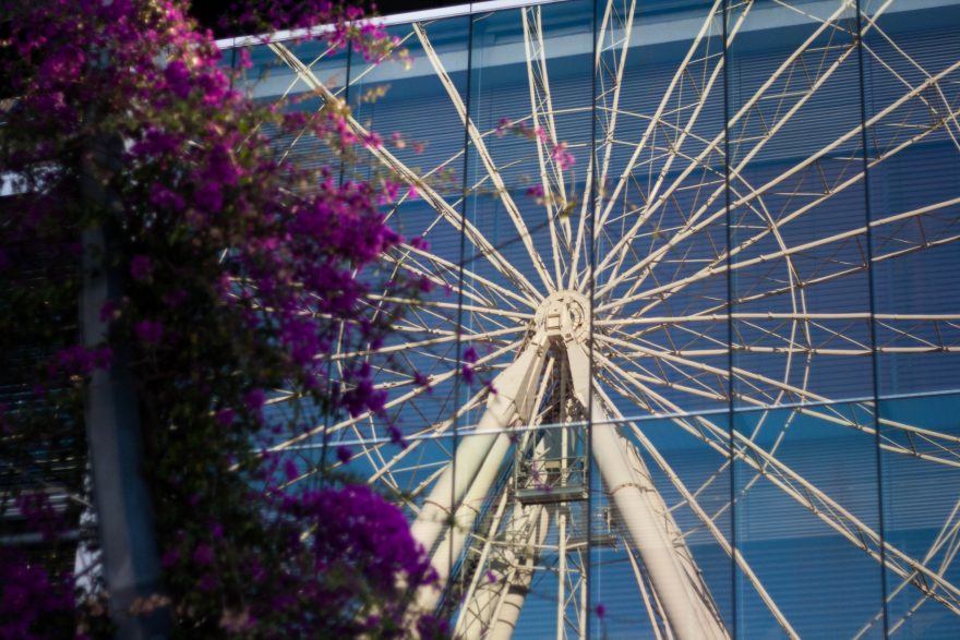Photography Workshop Brisbane - The southbank ferris wheel reflected in the window